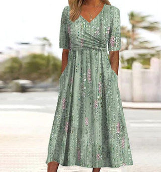 Damen Kleid mit V-Ausschnitt und Blumenmuster | Midi